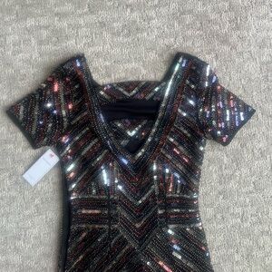 Brand new sequence dress from red dress boutique